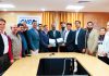 Ramesh Mukhiya, MD, CVPPL and Bhupesh Chandolia, CPM, REC Limited signing an agreement in Jammu on Tuesday.