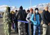 Passengers in queue to avail the service of AN-32 aircraft at Kargil Airport.