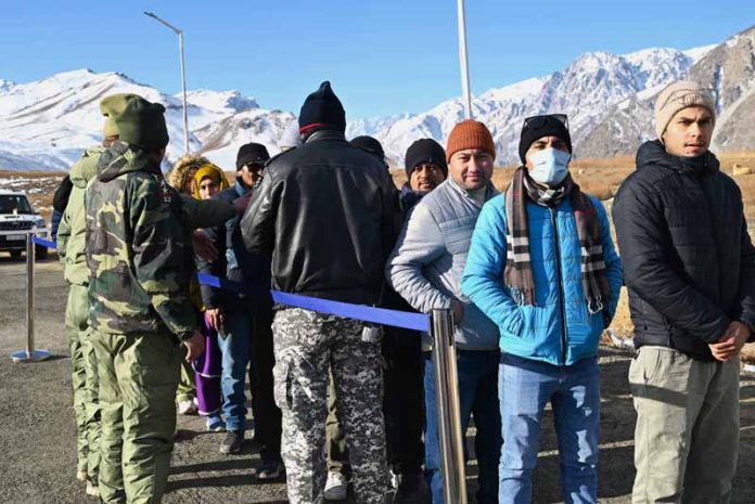 Passengers in queue to avail the service of AN-32 aircraft at Kargil Airport. Passengers in queue to avail the service of AN-32 aircraft at Kargil Airport.