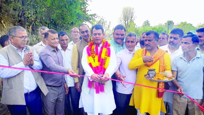 Senior BJP leader, Suresh Sharma inaugurating a road in Panchayat Rah of Block Chowki Choura on Friday.