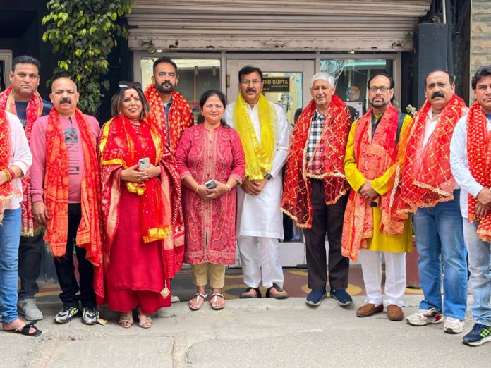 MLA Arvind Gupta posing with newly nominated BJP Talab Tillo Mandal team.