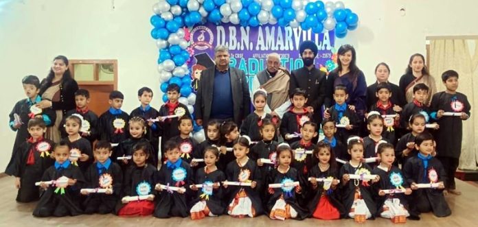 Students posing with dignitaries during the Pre-Primary Graduation Ceremony at DBN Vidya Mandir Amarvilla. Students posing with dignitaries during the Pre-Primary Graduation Ceremony at DBN Vidya Mandir Amarvilla.