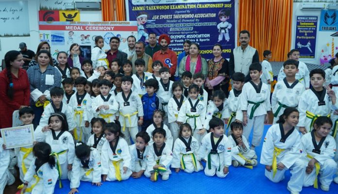 Budding Taekwondo players posing along with dignitaries during an event at Jammu. Budding Taekwondo players posing along with dignitaries during an event at Jammu.