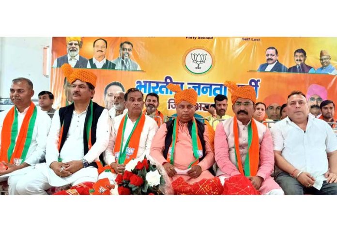J&K BJP chief Sat Sharma along with other party leaders during an organizational meeting in Akhnoor.