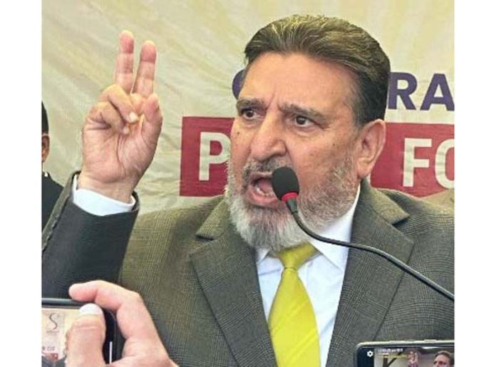 JKAP leader Altaf Bukhari addressing party convention in Srinagar.