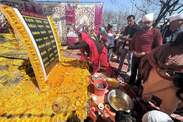 KPs paying tribute to 2003 victims at Nadimarg. -Excelsior/Sajad Dar