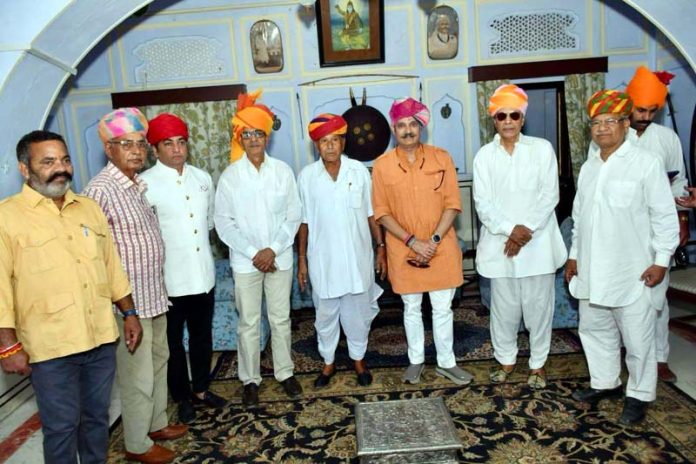 Former J&K MLC Vikramaditya Singh posing with dignitaries during a programme at Naraina (Jobner), Jaipur.