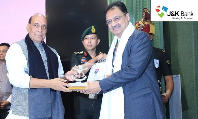J&K Bank MD & CEO Amitava Chatterjee being felicitated by Defence Minister Rajnath Singh in New Delhi on Monday. J&K Bank MD & CEO Amitava Chatterjee being felicitated by Defence Minister Rajnath Singh in New Delhi on Monday.