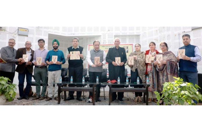 Dignitaries during a book releasing function at Jammu on Monday.
