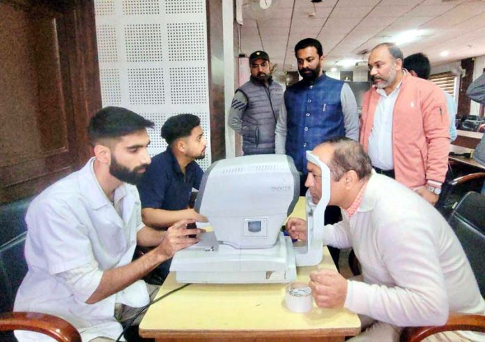 Doctors examining patients at free camp on Wednesday. Doctors examining patients at free camp on Wednesday.