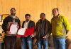 Representatives of CII Foundation and RDD Leh signing MoU at Leh on Wednesday.