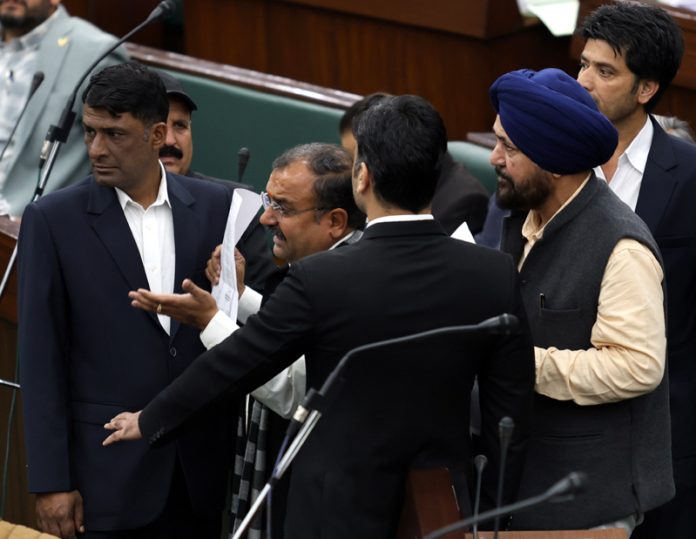 BJP MLAs protesting in the Assembly. —Excelsior/Rakesh