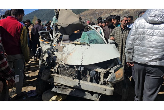 Ill-fated vehicle at Gund, Ganderbal on Sunday. - Excelsior/Firdous