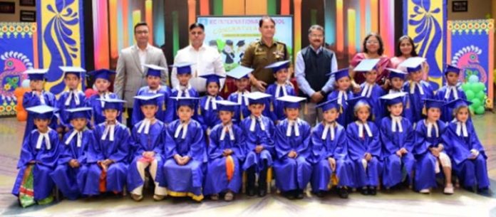 Students of KCIS Superkids along with others pose for a group photograph during an event on Saturday.