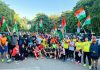 Runners posing for a group photograph at Jammu.