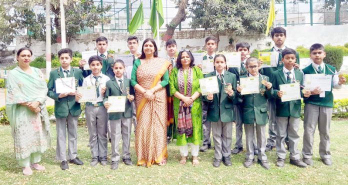 Students of DPS posing along with certificates. Students of DPS posing along with certificates.