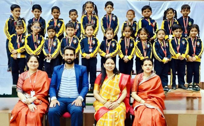 School Management posing along with students.