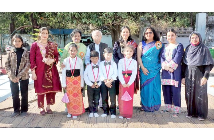 School management and dignitaries posing with students during prize distribution function. School management and dignitaries posing with students during prize distribution function.