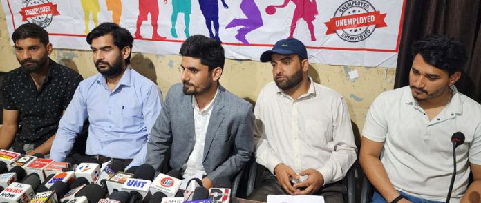 Unemployed Physical Education candidates addressing press conference at Press Club Jammu. — Excelsior/Rakesh