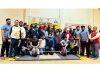 Weightlifters along with dignitaries posing for a photograph at Jammu.