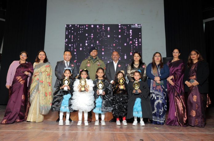 Dignitaries, school management and students posing at graduation day event. Dignitaries, school management and students posing at graduation day event.
