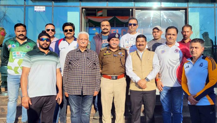 DIG Shiv Kumar Sharma and BJP Spokesperson Gaurav Gupta posing with J&K Veteran Cricket Team during flagging-off ceremony at Jammu.