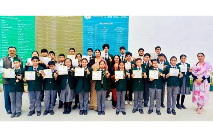 Students of DPS Jammu posing along with certificates. Students of DPS Jammu posing along with certificates.