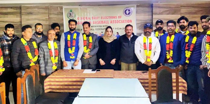 Newly elected members of J&K Amateur Baseball Association posing for photograph.