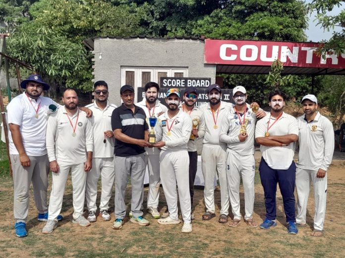 Players posing along with trophy during a match.