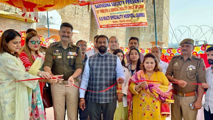 SP Jammu South, Ajay Sharma, cutting the traditional ribbon to inaugurate a medical camp at Bawe Wali Shrine on Tuesday.