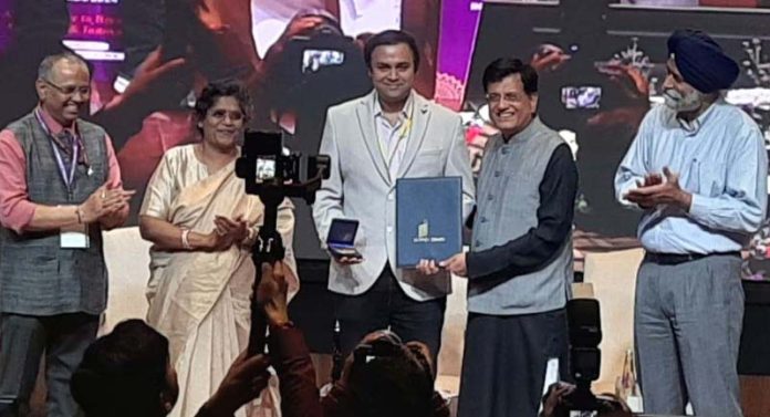 Piyush Goyal, Union Minister of Commerce & Industry presenting an award to Aayush Bhatnagar, senior vice president at JPL during an event held on Thursday.