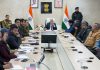 LG BD Mishra chairing a meeting in Leh on Thursday.