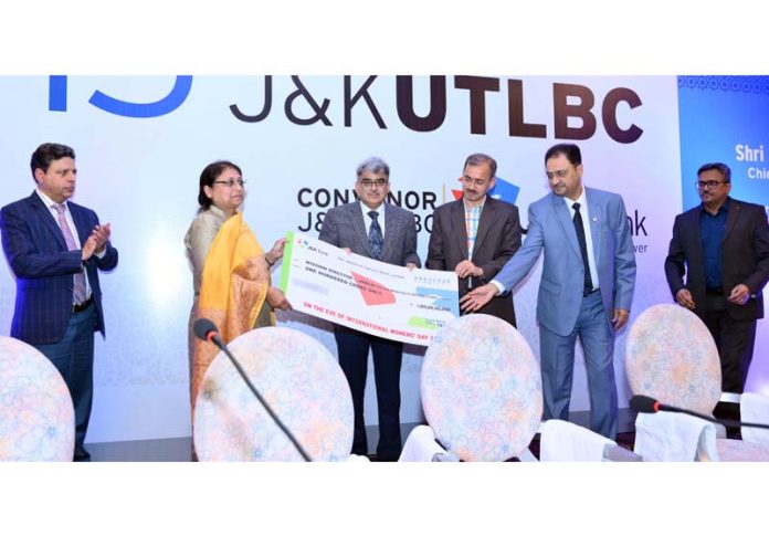 CS presenting token cheque to Mission Director JKRLM on Saturday.