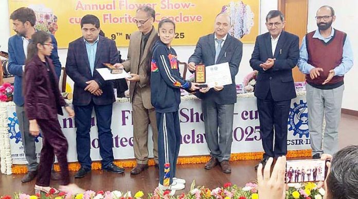DPS students receive awards during an event in Jammu.