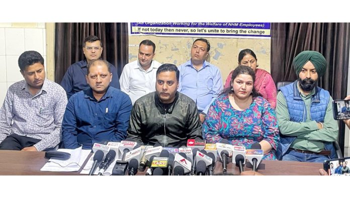Leaders of NHM Employees Association during a press conference at Jammu. Leaders of NHM Employees Association during a press conference at Jammu.