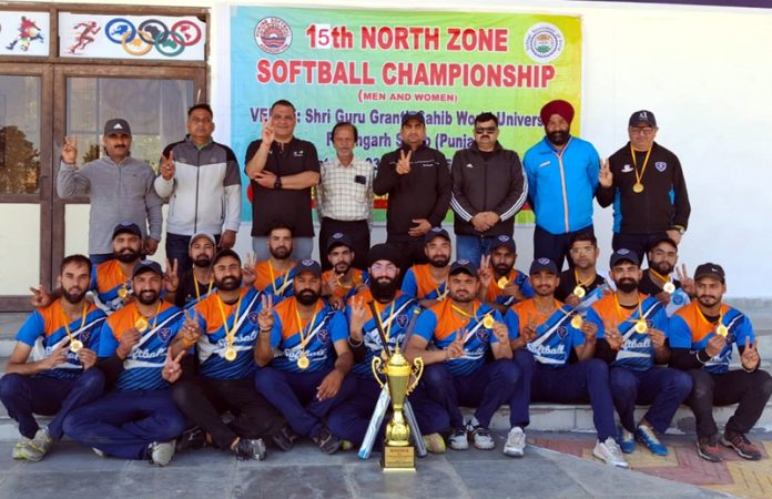 J&K Softball team posing along with trophy in Fatehgarh, Punjab.