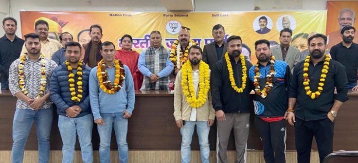 President Jammu and Kashmir BJP, Sat Sharma posing during felicitation programme. President Jammu and Kashmir BJP, Sat Sharma posing during felicitation programme.