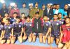 Dignitaries posing with players during inaugural event of 23rd Sub-Junior UT Kabaddi Championship at Udhampur.