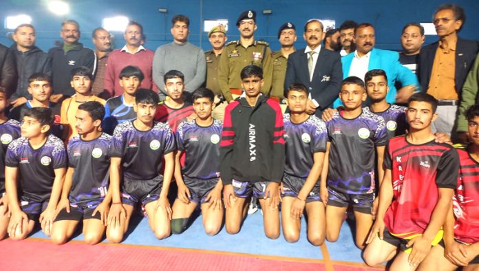 Dignitaries posing with players during inaugural event of 23rd Sub-Junior UT Kabaddi Championship at Udhampur.