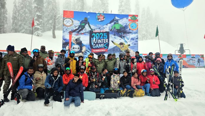 Players posing with officers during the closing ceremony of Chinar Open Winter Games 2025. -Excelsior/Abid Nabi