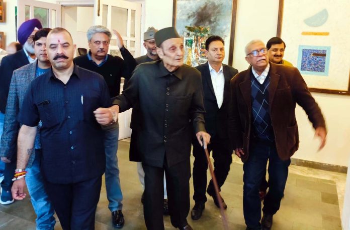 Dr Karan Singh watching rare art works put on display at Kala Kendra in Jammu on Friday.