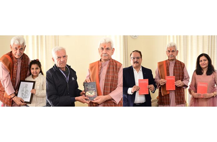 (From L to R) LG meeting influencer from Jammu, receiving book from veteran Journalist O P Sharma and releasing book of renowned author Ajay Khajuria. (From L to R) LG meeting influencer from Jammu, receiving book from veteran Journalist O P Sharma and releasing book of renowned author Ajay Khajuria.
