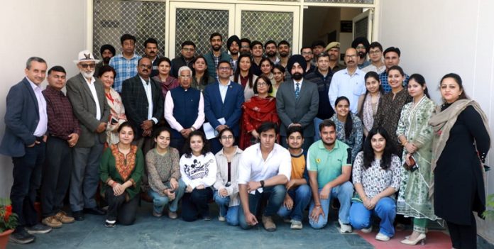 Co-Founder & CEO of Blue Planet, Prashant Singh, posing with IT students and faculty at JU in Jammu.