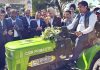 Union Minister Dr Jitendra Singh flagging off the CSIR-developed e-tractor roadshow from Jammu on Thursday. -Excelsior/Rakesh