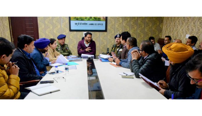 DM Sachin Kumar Vaishya chairing a meeting on Monday.