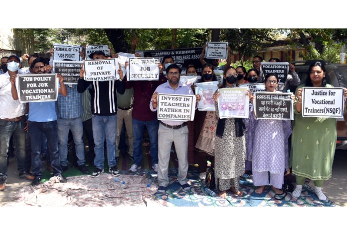 Vocational Trainers protesting at Jammu in support of their demands. — Excelsior/Rakesh
