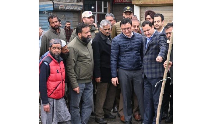 Minister Javed Ahmad Dar along with others during visit to Old Town Baramulla on Thursday.