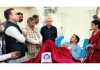 BJP president, Sat Sharma and LoP, Sunil Sharma enquiring about the health of injured cop at GMC Jammu on Monday.