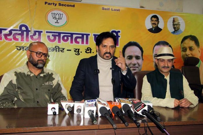 BJP spokesperson Dr Abhijeet Singh Jasrotia addressing a press conference in Jammu on Wednesday.