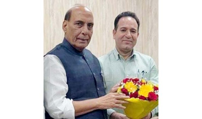 Sunil Sharma greeting Defence Minister Rajnath Singh with a flower bouquet in New Delhi on Friday. Sunil Sharma greeting Defence Minister Rajnath Singh with a flower bouquet in New Delhi on Friday.